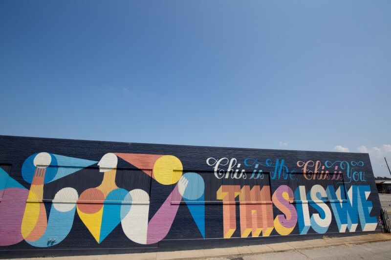 Spotted in the Broadway Avenue Arts District, this mural by Guillame Alby says, "This is me, this is you, this is we." We love the geometric shapes the multi-dimensional feeling it evokes.