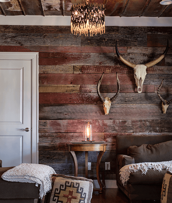Textured light fixtures and southwestern totems give the space the feel of a hip lodge.