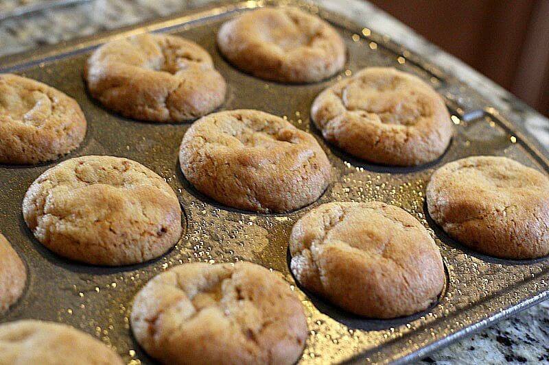 S'mores cookie cups with Nutella and marshmallows: cookies straight out of the oven and ready to be indented