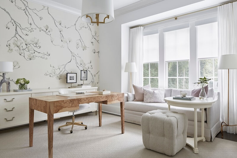 A white home office with a desk and chair.