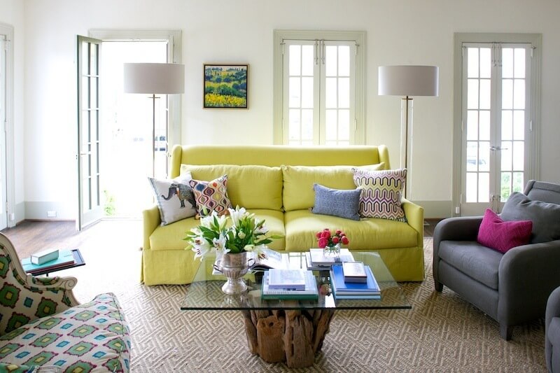 Natural light is a key component in making this space feel fresh. Leaving windows and doors undressed allows for maximum light to come in and invites the outdoors in.
