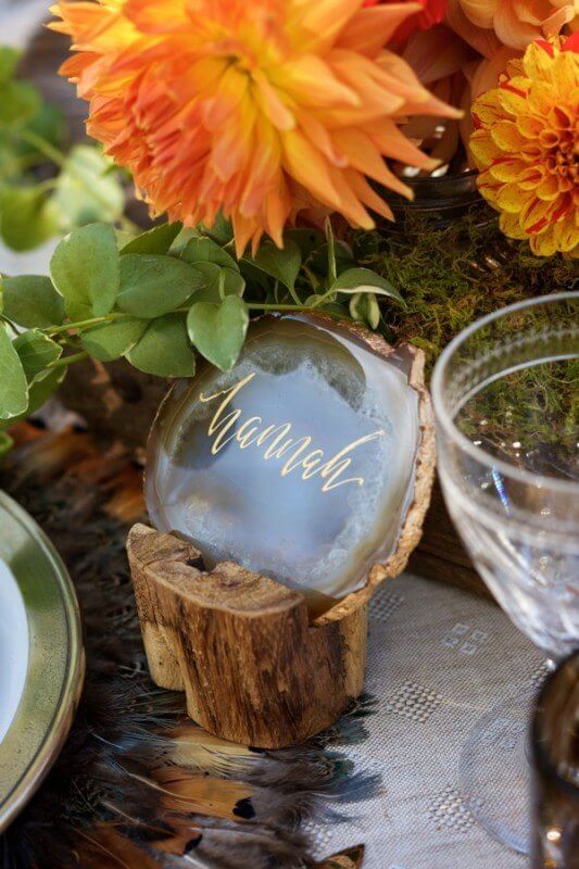 "I love the wooden handle mixed with the beautiful calligraphy-on-geo-stone place cards that Mariee Ami made," says Patricia.