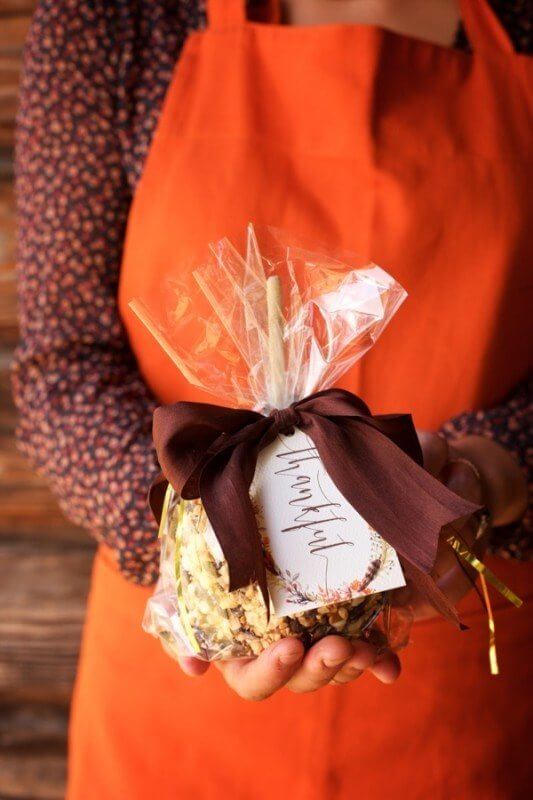 Mary Baugh of Mariee Ami pulled together this delicious party favor, a caramel apple crusted in crushed pecan-and-chocolate. She wrapped it with a bow and a custom gift tag in our Harvest Party theme!