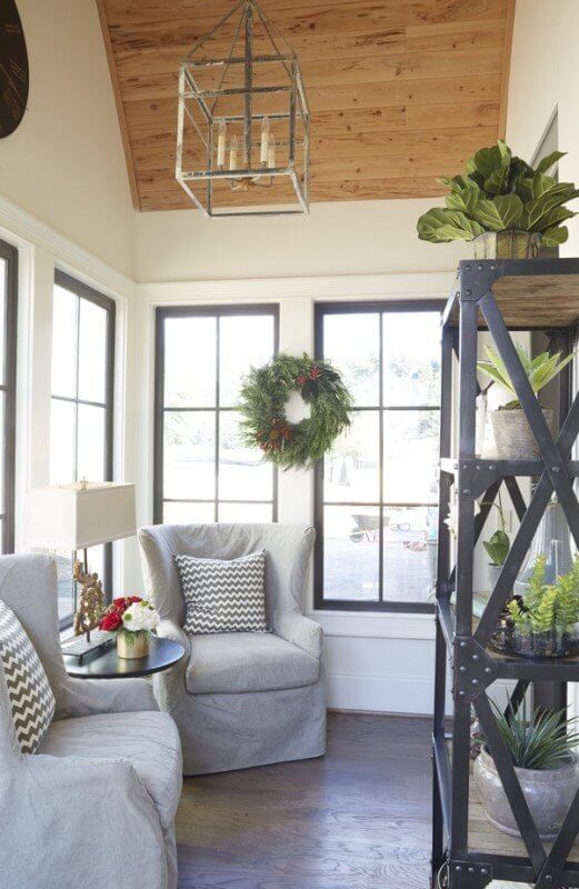 Adjacent to the central living area you’ll find this charming nook, complete with a vaulted wood ceiling and walls of large windows which let lovely natural light flood this calming retreat. This spot is the perfect vantage point from which to enjoy the beautiful outdoors or to curl up with a good book.