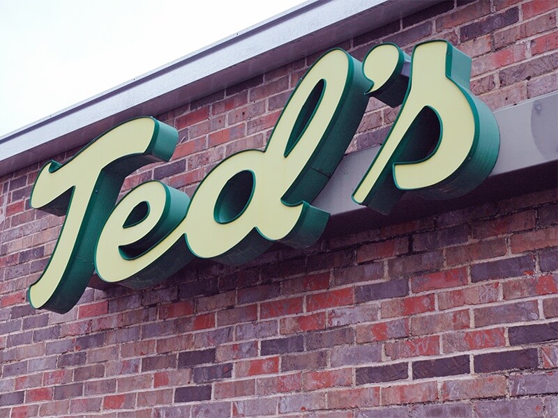 Ted's sign on the small, unassuming brick building that churns out Southern soul food every day