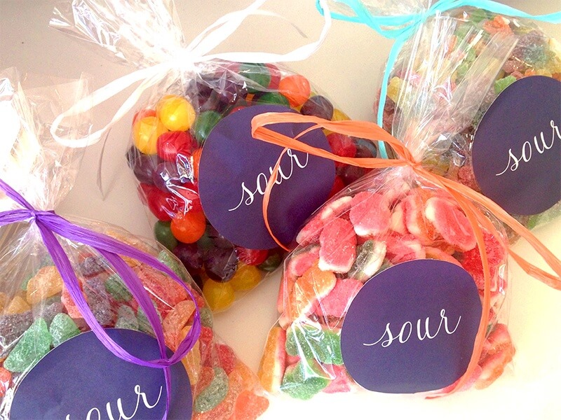 Sugar’s individually packaged bags of candy make for a sweet gift. You may even have them custom made with candies or colors of your choosing for the perfect party favor.