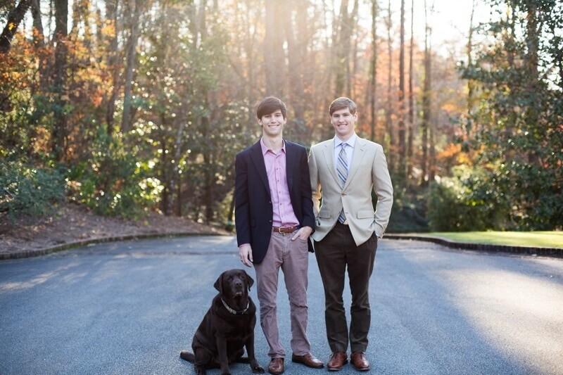 Brennan, right, and his brother, Cole, model Hartbrook Clothier's dapper duds alongside their adorable pooch, Homer! Hartbrook Clothier menswear