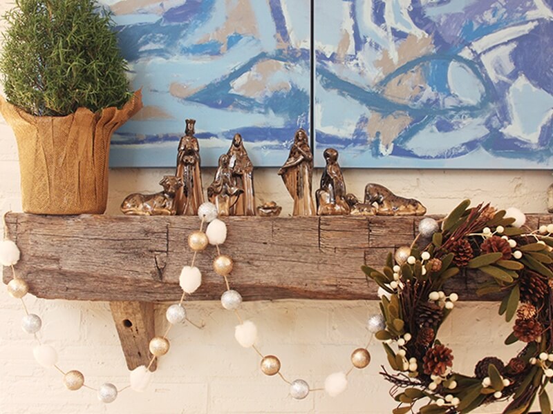 This mercury nativity has a subdued yet celebratory sheen that mirrors the calm, peaceful feel of this mantel arrangement.