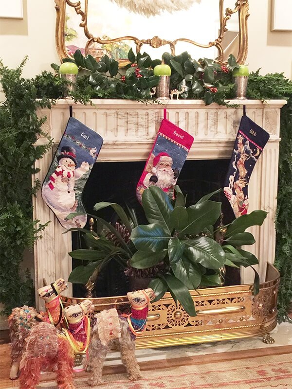 Note the tiny silver camels on the mantelpiece and the more colorful camels below, both providing a subtle reminder of the nativity scene.