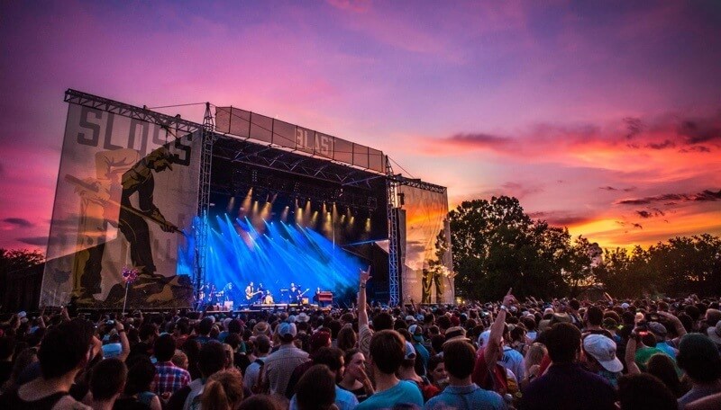 A gorgeous sun sets on an exuberant music-loving crowd at SlossFest 2015. Sloss Music and Arts Festival 2015