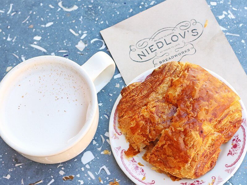 Niedlov's setup shop on Main Street in 2002 and were one of the first eateries in the nieghborhood Niedlov's chocolate croissant and chai latte ... yum
