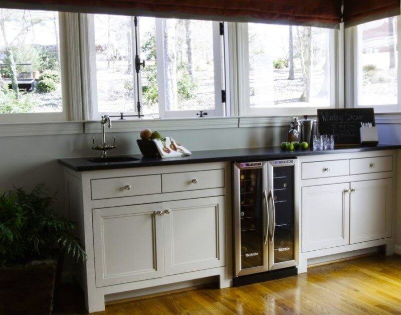 Multi-functional bar and serving area sophisticated farmhouse kitchen