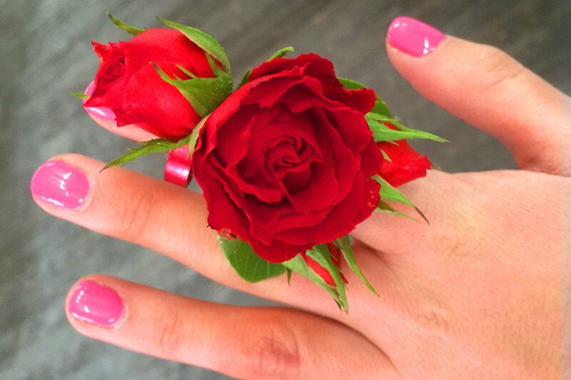 Now this is a way to present red roses ... by way of ring corsage!