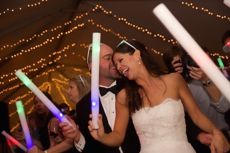 Hunter delights his blushing bride with some seriously sweet nothings! Seaside wedding