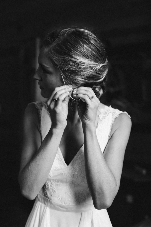 In addition to her wedding dress as her “something new,” Caroline wore her grandmother’s wedding bands on her right hand for her “something old” and had fabric from her mother-in-law’s wedding dress borrowed for her garter. 
