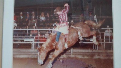 Alan Looney, shown here riding a bronco | Image courtesy of Alan Looney Alan Looney, shown here riding a bronco | Image courtesy of Alan Looney