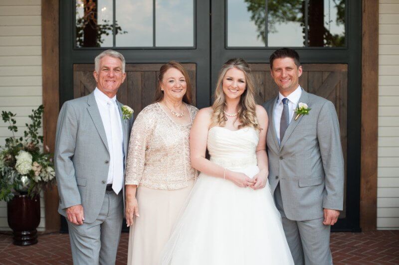 Before the ceremony, Katie and her family had their picture taken. In minutes, their family expands!