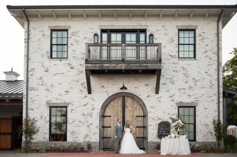 The arched doors make a perfect frame for the lovely couple!