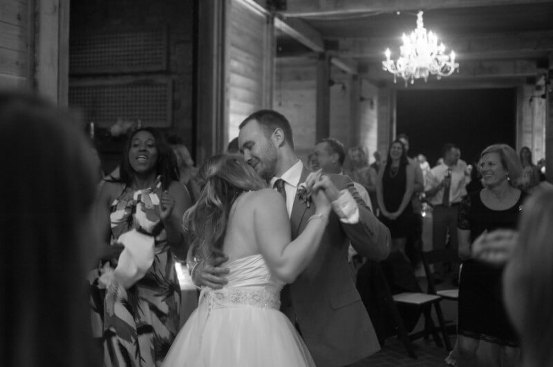 This photo shows off the interior of this venue well and captures a sweet moment!