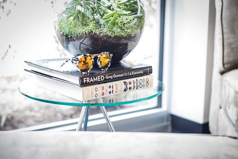Succulents in a terrarium offer a soothing, green touch, especially in a bedroom. 
