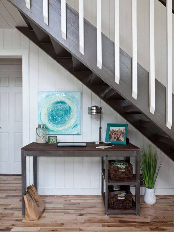 The mix of dark and light create a dynamic living space at this Lake Lanier wheelchair accessible home. Interior designer: Beth Johnson