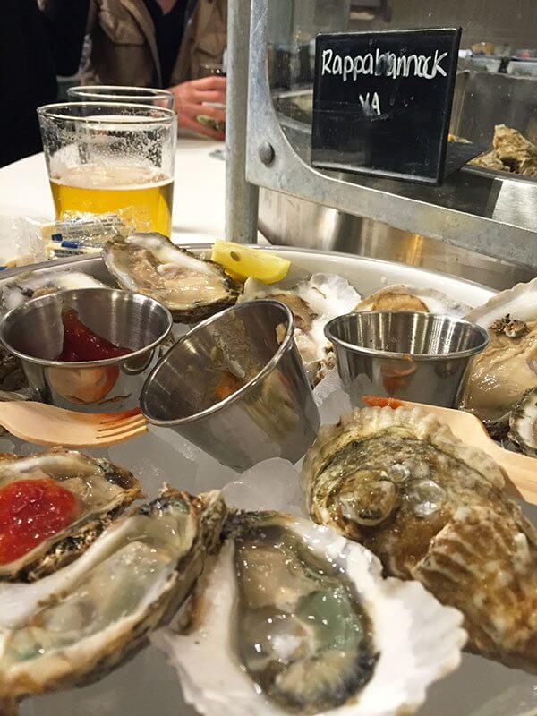 Raw oysters paired nicely with a Creature Comforts pilsner StyleBlueprint Atlanta Ponce City Market oysters
