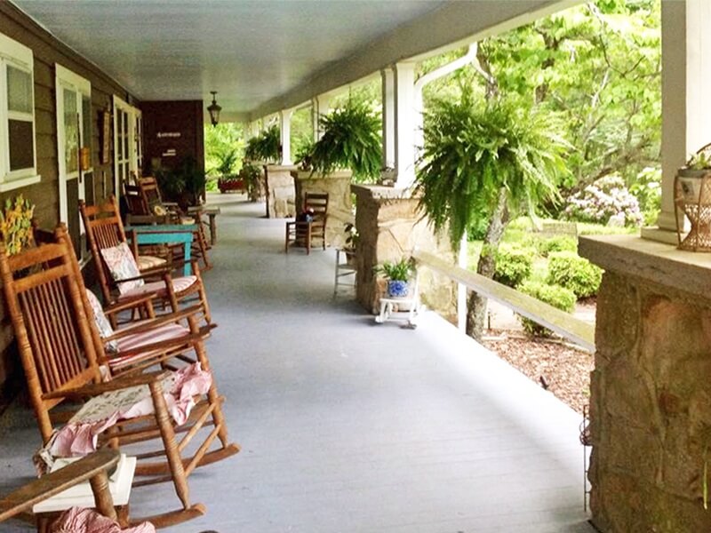 The peaceful wraparound porch at the Mentone Inn Mentone Inn