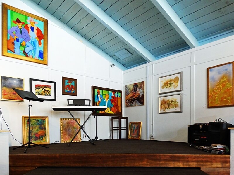One corner of Kamama's art gallery has a stage for live concerts. stage
