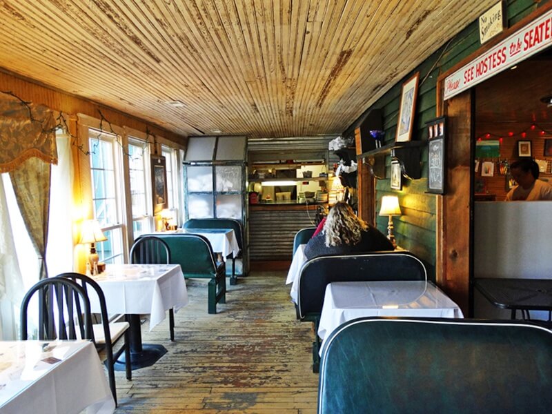 The dining area has an inviting rustic charm. Wildflower Cafe