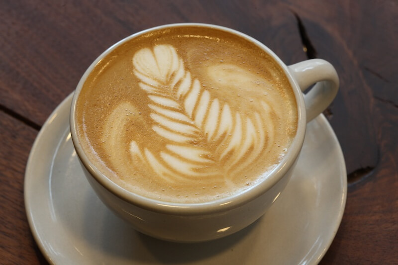 A beautiful, thick, creamy foam tops this latte with a lovely design. Image: StyleBlueprint