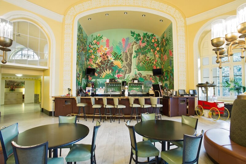 Check out the mural behind the bar at The Arlington