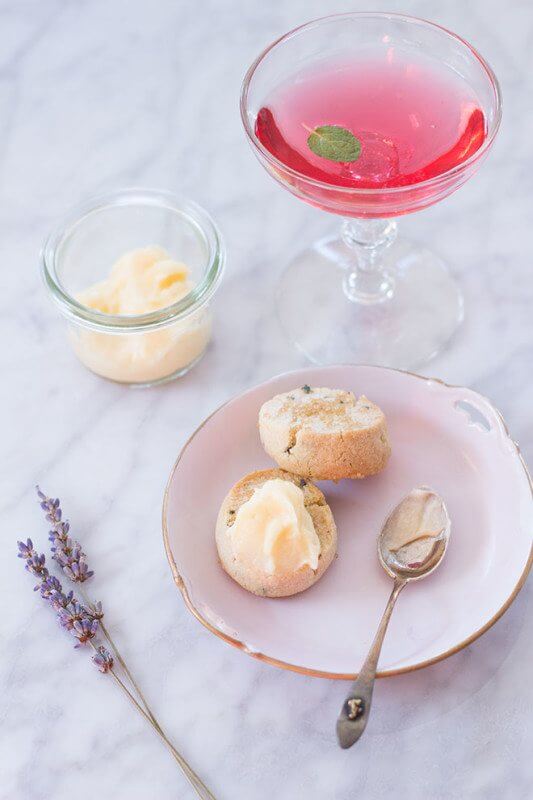 Hibiscus cocktail with lavender cookies and lemon curd whipped cream Hibiscus cocktail with lavender cookies and lemon curd whipped cream