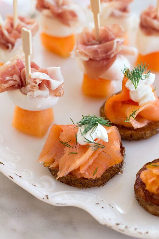 Mini-melon skewers and smoked salmon bites are on the menu today. Mini-melon skewers and smoked salmon bites are on the menu today.
