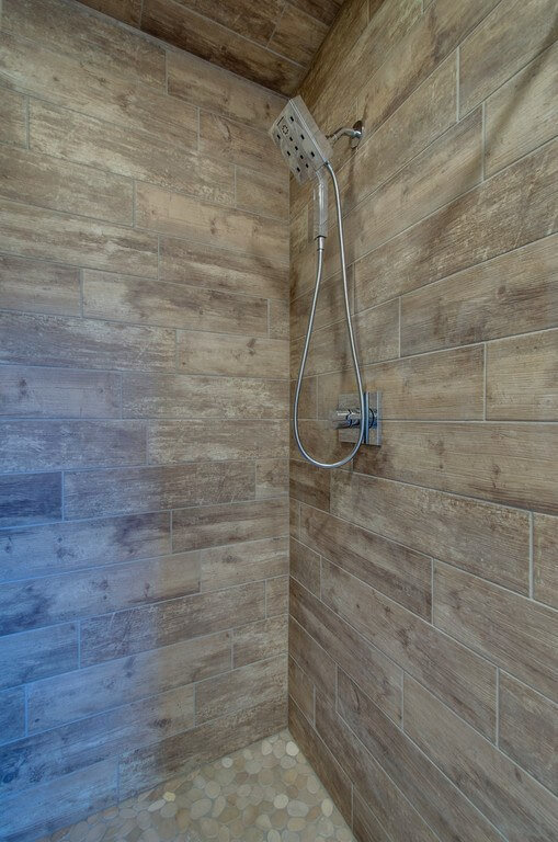 Great choice with the light tile In-law suite design, shower