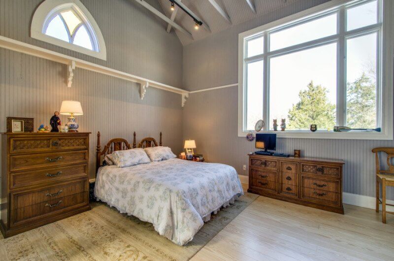 Character and light define the space In-law suite design, bedroom