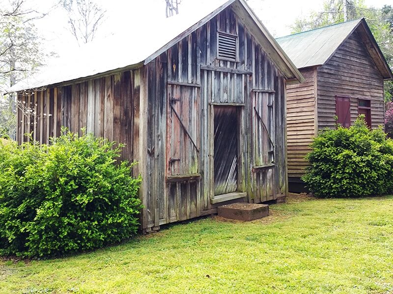 Behind the post office, this small building has housed a blacksmith, and auto repair shop and a gristmill. 
