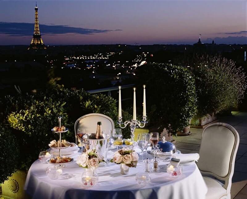 "As Parisians do, think about key accessories to accent your day and evening attire," says Alexis Eisaman of Le Meurice. "Include several scarves, a wrap as well as a stunning pair of heels and clutch for the evening. Don’t forget a chic costume necklace and bracelet to brighten up your look. A great pair of walking shoes and sunglasses are a must." Image: Le Meurice