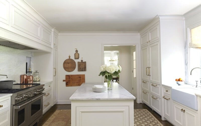Alabama white marble from Sylacauga is the crowning beauty of this kitchen. "In addition to the countertops, we choose to do full height slabs of Alabama white marble for the backsplash with the pretty detail on each side of the window that has become one of our signature styles," says Cyndy Cantley of Cantley & Company. Alabama white marble from Sylacauga is the crowning beauty of this kitchen. "In addition to the countertops, we choose to do full height slabs of Alabama white marble for the backsplash with the pretty detail on each side of the window that has become one of our signature styles," says Cyndy Cantley of Cantley & Company.