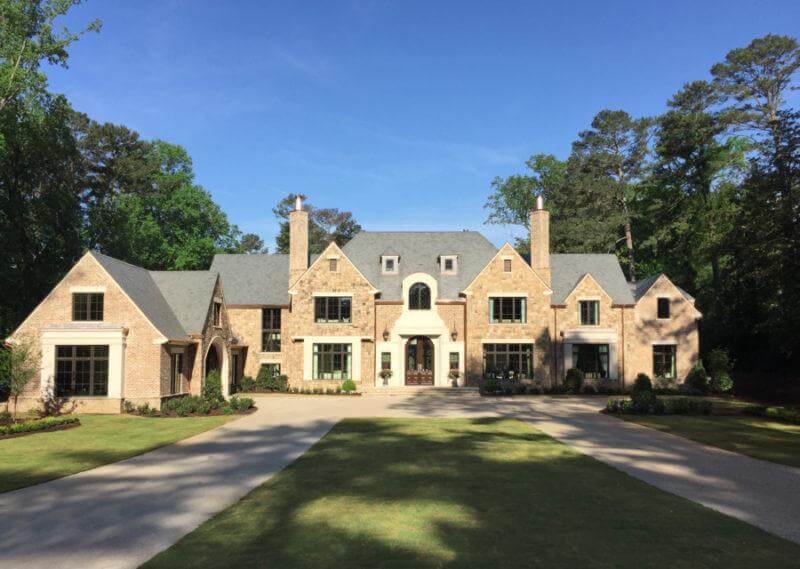 The home is an English manor-style home. SDSG_exterior1