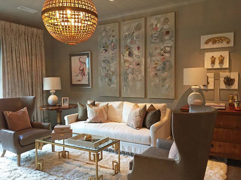 The feminine room is another space inspired by Pantone's color of the year with a rose quartz hue. sb-atlanta-southeasternhome-upstairslivingroom