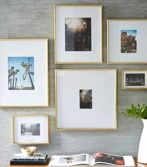 Family photos mounted in gold frames creates a beautiful gallery of your favorite memories. 