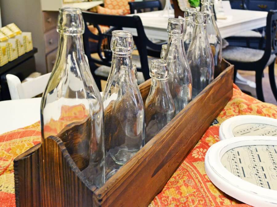 This bottle holder would be the perfect centerpiece with fresh flowers!