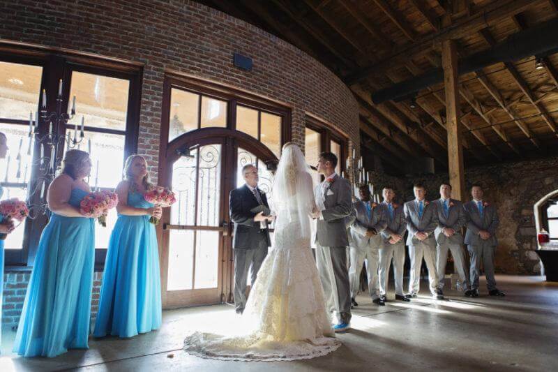 The couple exchanged vows by beautiful natural sunlight pouring in through the windows. StyleBlueprint Weddings: Emily and Dustin Miller, Lovi Blush Photography