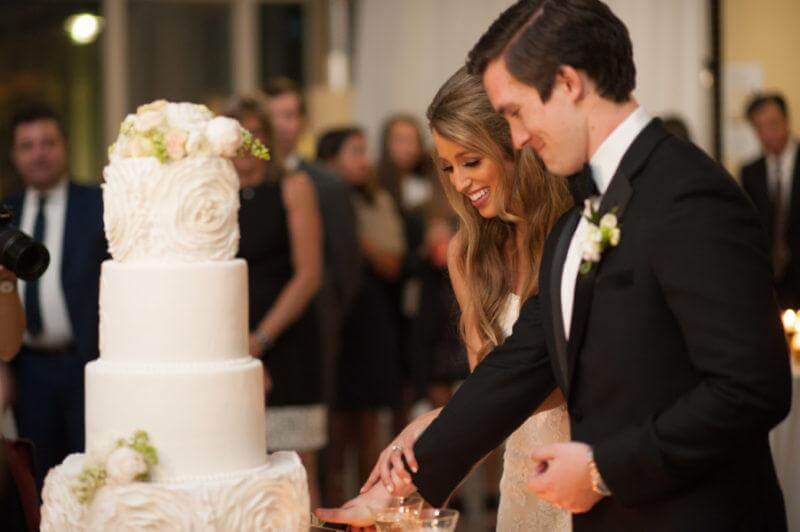 Lauren and John cut the cake.