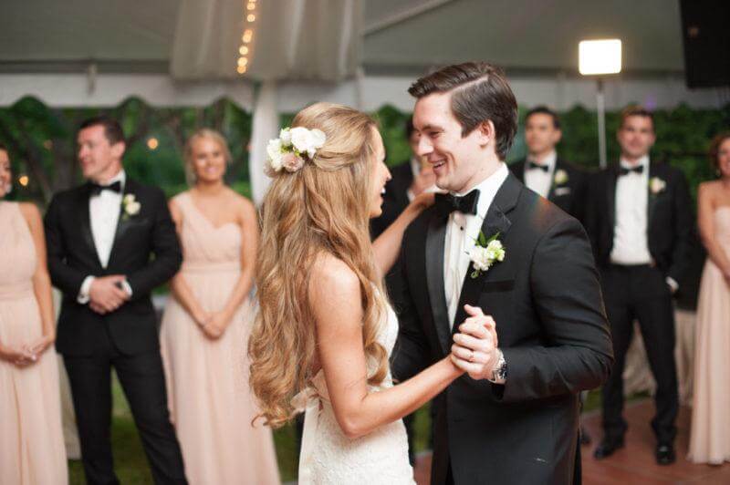 Lauren and John entered the dance floor for their first dance to "Can't take My Eyes Off of You" by Franki Valli and the Four Seasons.