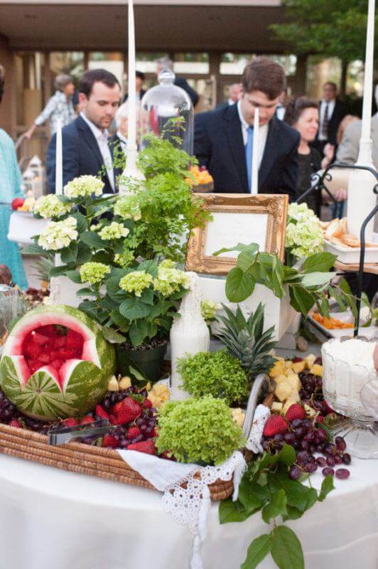 A fresh fruit arrangement contained grapes, strawberries, pineapple, kiwi and watermelon and was accompanied by a fluffy fruit dip.