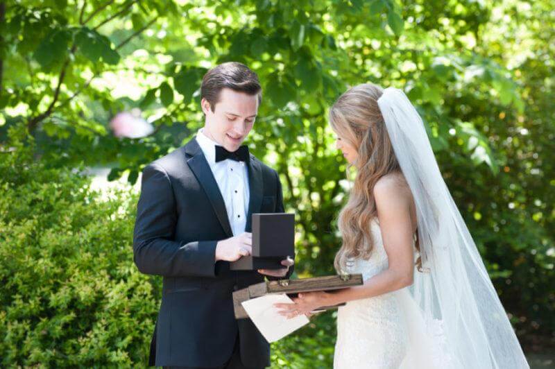 The couple shared a private moment before the wedding ceremony, exchanging traditional bride and groom gifts.