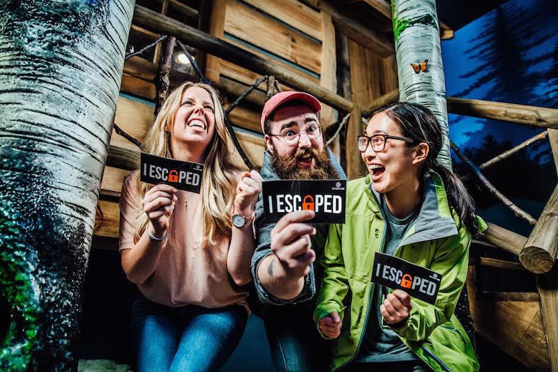 Three people who completed an Escape Game