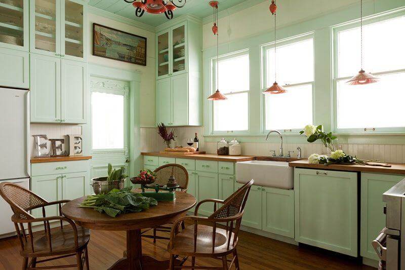 “This Dutch painting I found in an antique store in the Texas Hill Country,” says the designer. “It fit perfectly above the door to the screened porch, and helped draw attention to the unique German carving in the door.” “This Dutch painting I found in an antique store in the Texas Hill Country,” says the designer. “It fit perfectly above the door to the screened porch, and helped draw attention to the unique German carving in the door.”