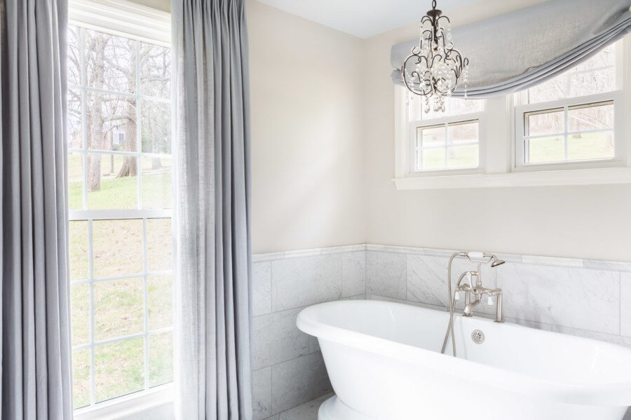 That bathtub, with those views. Yes, please. See what this interior designer can do to any space! Image: Alyssa Rosenheck Photography